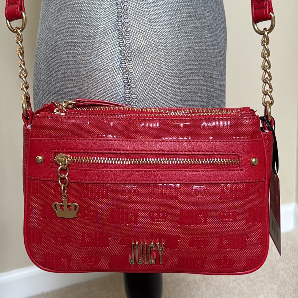 Juicy Red crossbody purse. 2 center zip compartments & snap compartment between.
